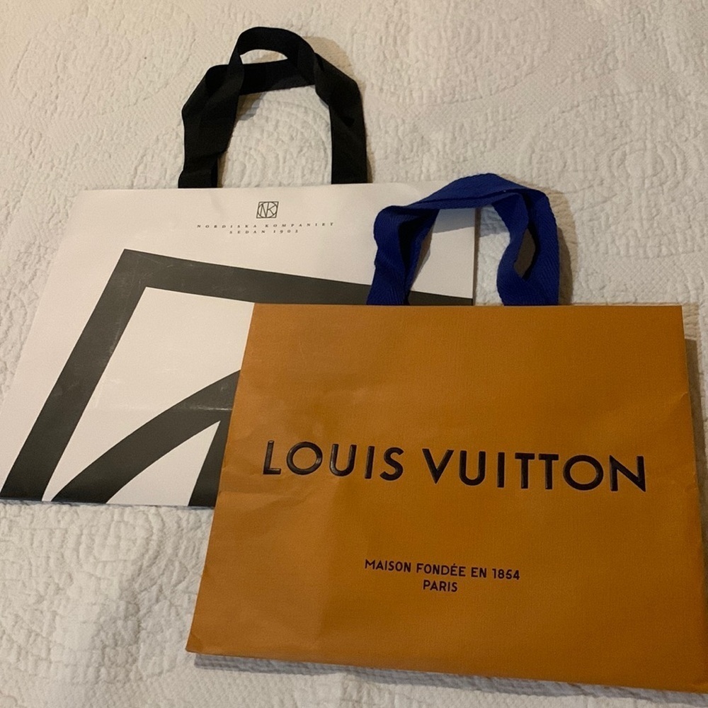 Louis Vuitton and Nordiska Kompaniet bags.